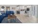 Open-concept layout seamlessly connects the living room to the modern kitchen and dining area at 1801 N Ocean Blvd. # Q-2, North Myrtle Beach, SC 29582