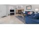 Cozy living room boasts a brick fireplace, plush seating, and bright, natural light at 1801 N Ocean Blvd. # Q-2, North Myrtle Beach, SC 29582