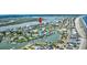 Magnificent aerial view of coastal community along winding waterways, offering stunning waterfront living and boating opportunities at 1924 Pompano Dr., Garden City Beach, SC 29576