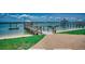 Beautiful waterfront view with a pier, gazebo, dock, and access to the water and beach at 1924 Pompano Dr., Garden City Beach, SC 29576