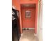 Hallway with a black refrigerator, and a doorway at 2005 Greens Blvd. # F-205, Myrtle Beach, SC 29577