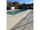 Community swimming pool with a security fence at 2005 Greens Blvd. # F-205, Myrtle Beach, SC 29577