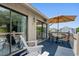 Balcony with outdoor seating offers a private outdoor space for relaxation and entertaining at 202 Maison Dr. # L-301, Myrtle Beach, SC 29572