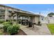 A covered grilling area featuring multiple grills for residents' outdoor cooking and enjoyment at 202 Maison Dr. # L-301, Myrtle Beach, SC 29572