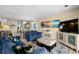 Relaxing living room with plush blue sofas and beach-themed decor evokes coastal comfort at 202 Maison Dr. # L-301, Myrtle Beach, SC 29572