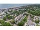Expansive aerial shot featuring a beautiful beachfront community and sparkling ocean views at 212 Millwood Dr., Surfside Beach, SC 29575