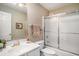 Bathroom featuring a glass shower, single vanity, and towel racks at 212 Millwood Dr., Surfside Beach, SC 29575
