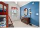 Bedroom showcasing a bunk bed, a dresser and lamp with blue accent wall at 212 Millwood Dr., Surfside Beach, SC 29575