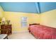 Small bedroom featuring a bed, side table, and window with a light wood floor at 212 Millwood Dr., Surfside Beach, SC 29575