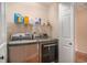 Laundry room showcasing front load washer and dryer with shelving for storage at 212 Millwood Dr., Surfside Beach, SC 29575