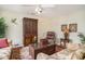 Cozy living room with warm colors, tropical accents, and a comfortable seating arrangement at 212 Millwood Dr., Surfside Beach, SC 29575