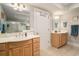 Well-appointed bathroom with dual vanities, tiled floors, and ample lighting for a refreshing experience at 2180 Waterview Dr. # 725, North Myrtle Beach, SC 29582