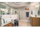 Relaxing bathroom features a soaking tub, a glass-enclosed shower, and ample counter space at 2180 Waterview Dr. # 725, North Myrtle Beach, SC 29582