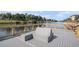 Dock on waterway featuring a built-in bench with a wooden railing at 2180 Waterview Dr. # 725, North Myrtle Beach, SC 29582