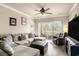 Inviting living room features a sectional sofa, recliner, and sliding glass doors to balcony at 2180 Waterview Dr. # 725, North Myrtle Beach, SC 29582