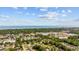 Aerial view displaying a charming coastal city with lush greenery and beautiful ocean views at 219 Caropine Dr., Surfside Beach, SC 29575