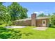 Spacious backyard with a patio and greenery at 2415 Magnolia Lane, Little River, SC 29566