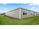 A green lawn compliments the gray siding of this one story home at 2859 Riverboat Way, Conway, SC 29526