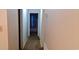 Hallway with neutral walls and carpet, leading to private quarters and living spaces at 289 Whites Creek Rd., Georgetown, SC 29440