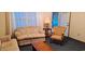 Comfortable living room with neutral decor, featuring a sofa set and bright natural light at 289 Whites Creek Rd., Georgetown, SC 29440