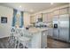 Kitchen with granite countertops, stainless steel appliances, gray cabinets, and a window at 292 Clear Lake Dr., Conway, SC 29526