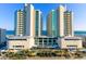 A vista of a luxury beach resort featuring modern architecture and ocean views at 304 N Ocean Blvd. # 1113, North Myrtle Beach, SC 29582