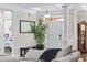 Inviting foyer features elegant columns, a decorative mirror, a grandfather clock, and views into the living area at 310 Babylon Pine Dr., Myrtle Beach, SC 29579