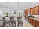 Beautiful kitchen featuring granite countertops, stainless steel appliances, breakfast bar seating, and wood cabinetry at 310 Babylon Pine Dr., Myrtle Beach, SC 29579