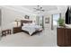 Spacious main bedroom offers a serene retreat with a tray ceiling, natural light, and a calming, neutral color scheme at 310 Babylon Pine Dr., Myrtle Beach, SC 29579