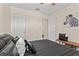 Bedroom with a zebra themed decor on a bed with a tufted ottoman at 314 Lyons Cove Dr., Myrtle Beach, SC 29577