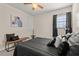 Bedroom featuring a zebra themed pillow on a bed with a ceiling fan and unique decor accents at 314 Lyons Cove Dr., Myrtle Beach, SC 29577