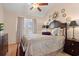 Inviting bedroom with vaulted ceiling, elegant bedding, and designer touches at 314 Lyons Cove Dr., Myrtle Beach, SC 29577