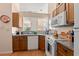 Well-maintained kitchen with modern appliances, granite countertops, and ample counter space for food preparation at 314 Lyons Cove Dr., Myrtle Beach, SC 29577