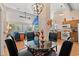Open concept living and dining area with hardwood floors and views of the living room and kitchen at 314 Lyons Cove Dr., Myrtle Beach, SC 29577