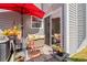 Charming outdoor patio with seating area, umbrella, and garden accents at 314 Lyons Cove Dr., Myrtle Beach, SC 29577
