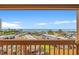 Stunning balcony view showcasing the ocean, pier, palm trees and RV park at 3211 S Ocean Blvd. # 204, Myrtle Beach, SC 29577