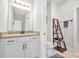 Bathroom with granite countertops, undermount sink, and decorative wood shelving at 338 St. Julian Ln., Myrtle Beach, SC 29579