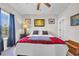 Bedroom with a large window and a bed with red plaid blanket at 338 St. Julian Ln., Myrtle Beach, SC 29579