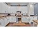 Modern kitchen with stainless steel appliances, granite countertops, and ample cabinet space at 338 St. Julian Ln., Myrtle Beach, SC 29579