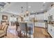 Spacious kitchen with stainless steel appliances, granite countertops, and adjacent dining area at 338 St. Julian Ln., Myrtle Beach, SC 29579