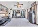 Open loft features a ceiling fan, multiple speakers, and a large image providing an ideal space for entertainment at 338 St. Julian Ln., Myrtle Beach, SC 29579