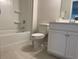 Bright bathroom with a bathtub, shower, toilet, and vanity with sink at 3391 Moss Bridge Ln., Myrtle Beach, SC 29579