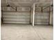 Spacious two-car garage with white doors and unfinished drywall at 3391 Moss Bridge Ln., Myrtle Beach, SC 29579