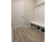 Mudroom features cubbies, coat hooks, and durable laminate flooring at 3391 Moss Bridge Ln., Myrtle Beach, SC 29579