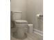 Close-up shot of white toilet, tile floor and bathroom accessories at 3391 Moss Bridge Ln., Myrtle Beach, SC 29579