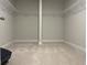 Spacious walk-in closet with shelving and carpet flooring at 3391 Moss Bridge Ln., Myrtle Beach, SC 29579