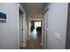 Hallway with wood-look flooring and closet space at 3401 Dunes St. # A3, North Myrtle Beach, SC 29582