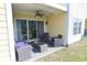 Relaxing patio space features outdoor seating, a ceiling fan, and a tranquil setting at 3401 Dunes St. # A3, North Myrtle Beach, SC 29582