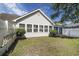 Well-maintained backyard with a privacy fence, lush lawn, and direct access to the home at 3910 Stillwood Dr., Myrtle Beach, SC 29588
