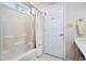 En suite bathroom features a shower-tub combination, vanity, and natural light at 3910 Stillwood Dr., Myrtle Beach, SC 29588